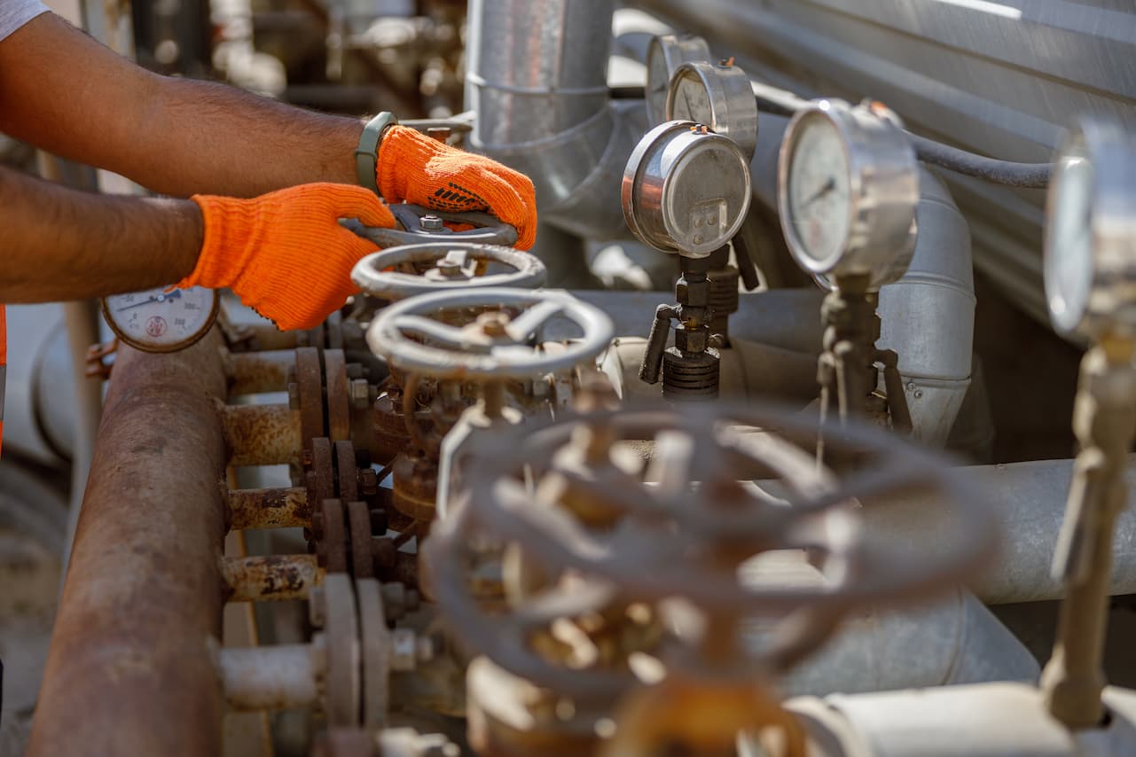 industrial-worker-on-his-job-at-construction-plant-2022-02-15-20-10-31-utc